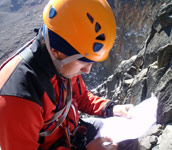 LLada studies topo during our Batian (5199m) climb, Mt. Kenya